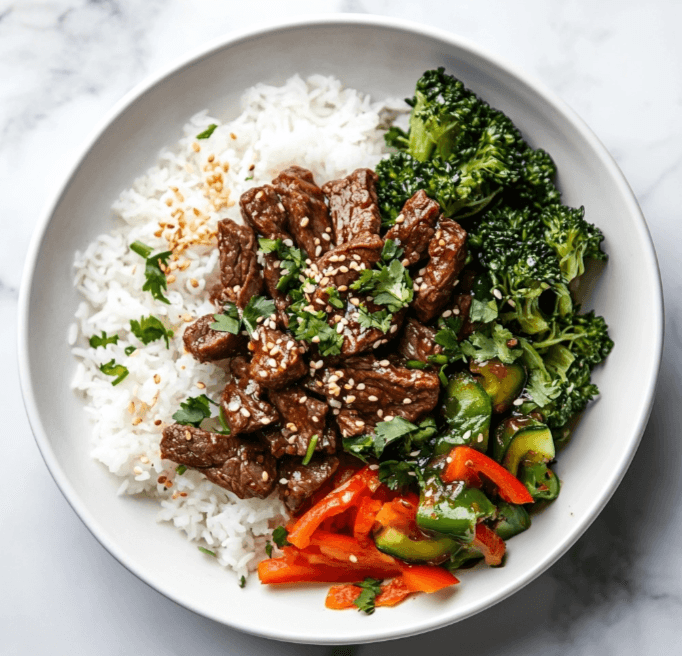 A beautifully plated Korean Beef Bowl on a modern plate